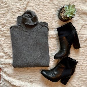Turtleneck sweater with buckle detail